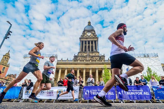 Runners enter the final stretch outside Leeds Town Hall. (Pic: James Hardisty)