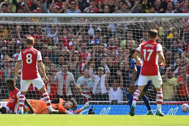 SHOCKER: Eddie Nketiah cashes in on huge Illan Meslier blunder to put Arsenal ahead. Photo by GLYN KIRK/AFP via Getty Images.