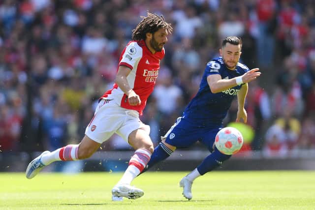 Jack Harrison pursues Mohamed Elneny during Leeds United's 2-1 defeat to Arsenal. Pic: Mike Hewitt.