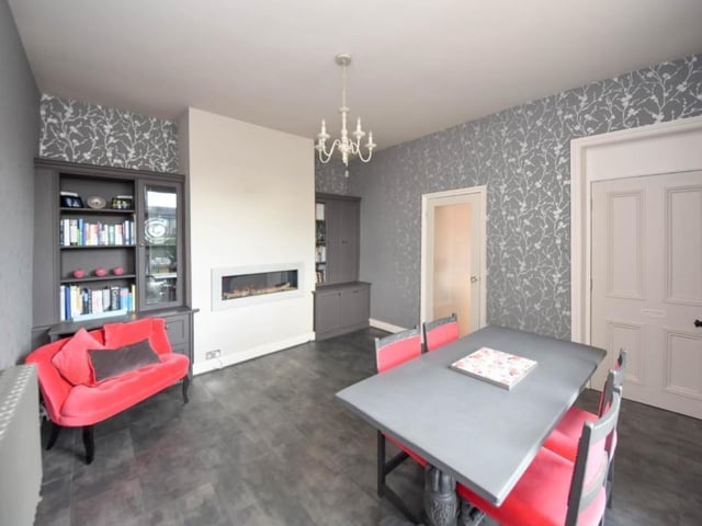 This is a versatile room that could equally serve as a study or home office, a second sitting room or other use.