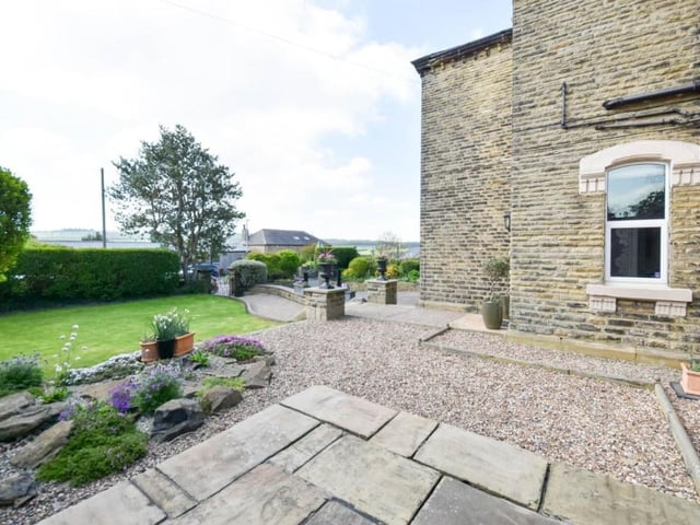 Lawns, and established trees, plants and shrubs, all form part of the impressive gardens.