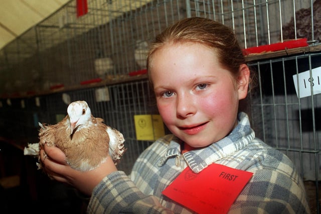 Fiona Platt who won first prize with her Frillback Pigeon in May 1997.