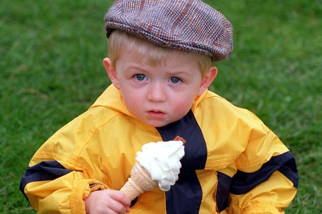 James Robertshaw takes time out to enjoy a nice cool ice-cream in May 1997.