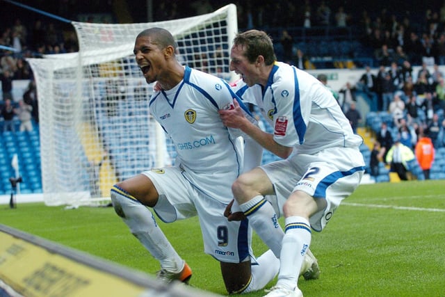 Jermaine Beckford celebrates his first goal with Aidy White.