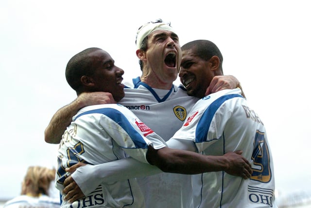 Jermaine Beckford celebrates his second goal with Fabian Delph and Andrew Hughes.