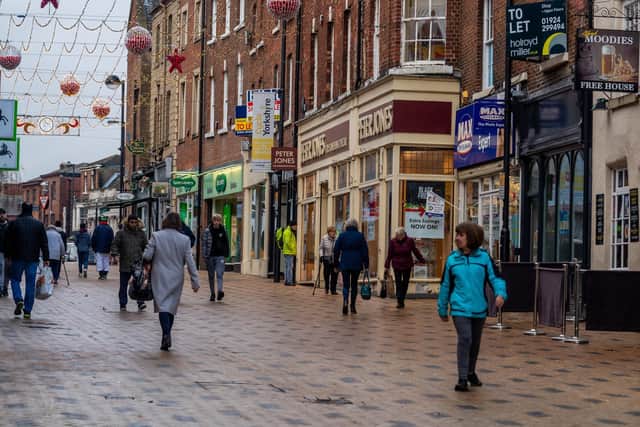 A busy shopping street in the centre of Wakefield. Picture: James Hardisty