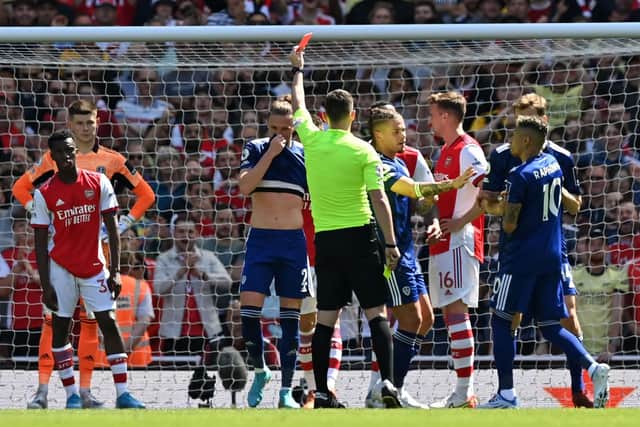 Luke Ayling is shown a straight red card for a dangerous foul on Gabriel Martinelli during Leeds United's 2-1 Premier League defeat to Arsenal. Pic: Glyn Kirk.