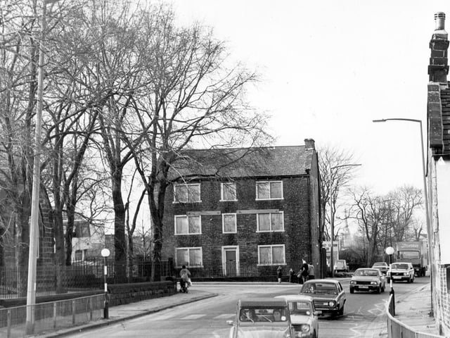 Lower Town Street, showing the junction with Back Lane, leading off to the left in February 1983. In the centre is Town End House, a listed building at no.9 Lower Town Street. Although vacant at the time of the photograph, it was soon to be redeveloped into flats