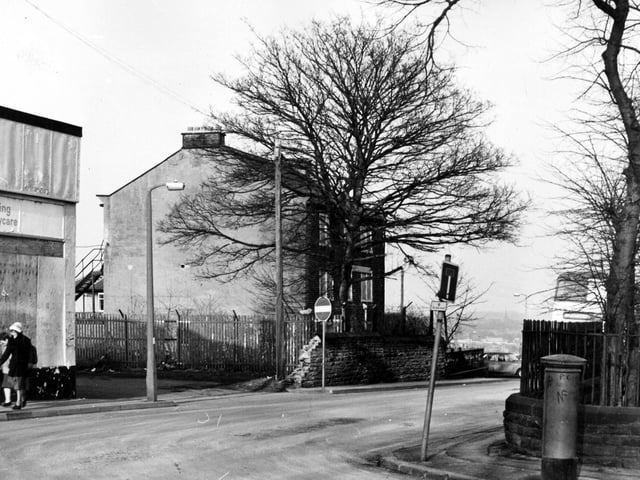 Back Lane from the junction with Stanningley Road in February 1983. In the centre is Town End House, a Grade II listed building dating back to the late 18th century, which is numbered 9 Lower Town Street, this being the junction with Back Lane on the right.