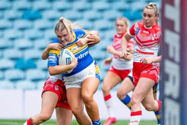 Leeds Rhinos' Zoe Hornby on her way to scoring a try against St Helens in the Women's Challenge Cup final on Saturday. Picture: Allan McKenzie/SWpix.com.