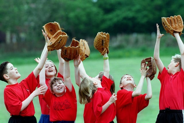 Pupils at Bramhope Primary practise catching during a baseball day held at the school.