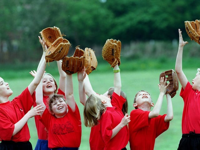 Pupils at Bramhope Primary practise catching during a baseball day held at the school.
