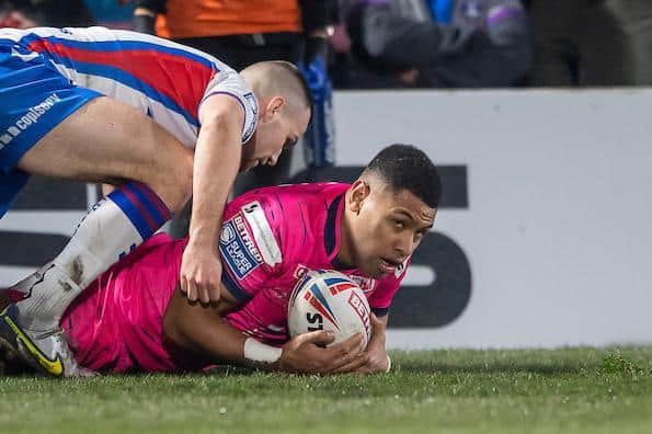 David Fusitu'a is tackled by Max Jowitt in Rhinos' win at Wakefield two months ago. Picture by Allan McKenzie/SWpix.com.
