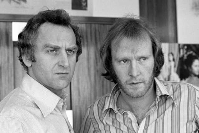 Dennis Waterman, right, with John Thaw in a scene from The Sweeney. Picture by PA.