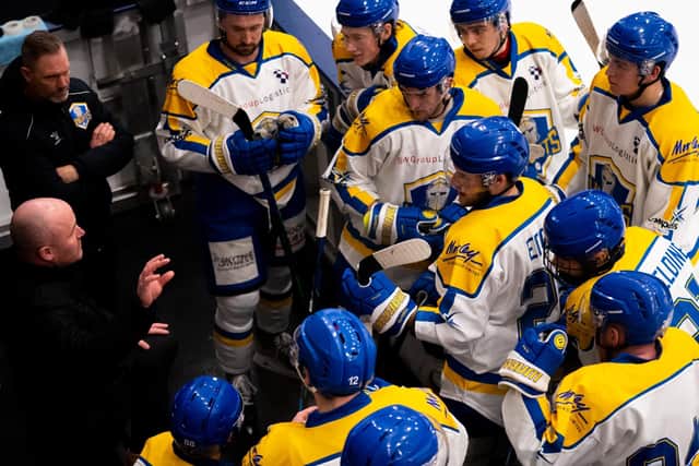 BENCH IMPRESS: Ryan Aldridghe (far left) instructs his players during a brief break in play during a game at Elland Road. Picture courtesy of Oliver Portamento.