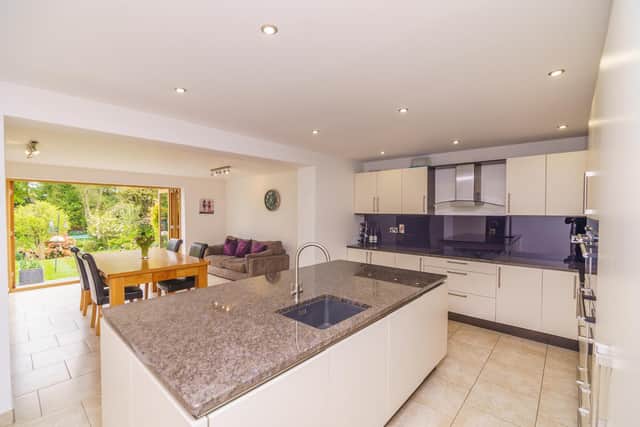 The ground floor offers a large amount of flexible reception space, with a large open plan kitchen/diner