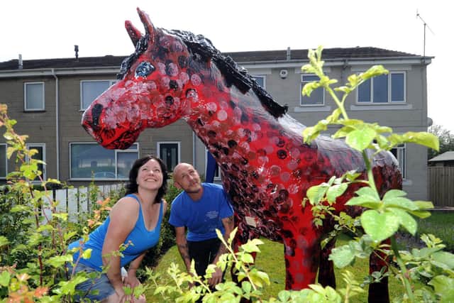 Bright red horse spotted at a previous art walk.