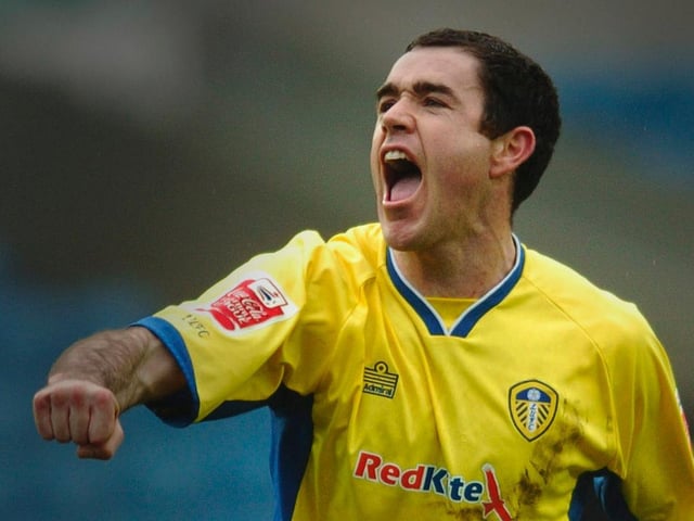 Andy Hughes celebrates scoring against Millwall at The Den in April 2008.
