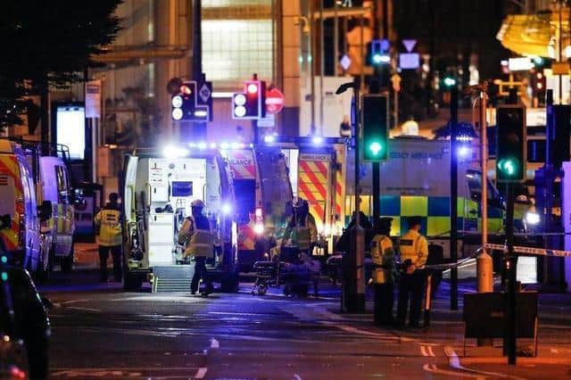 Emergency services at the scene of the Manchester Arena bombing in May 2017. Picture: SWNS.