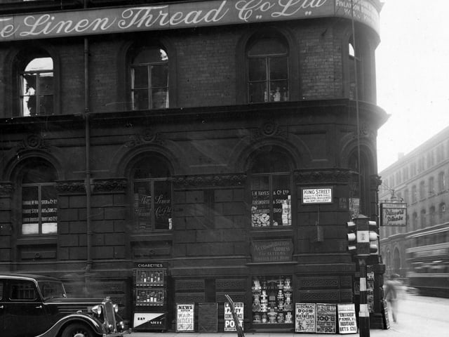The junction of Wellington Street with King Street in June 1939. Pictured is The Linen Thread Co. Ltd, F.W.Hayes and Co. Ltd., Ainsworth and Sons Ltd., Crawford Bros. Ltd., Dunbar McMaster & Co.Ltd., Robert Stewart & Sons Ltd., North British Boot Co. Ltd.