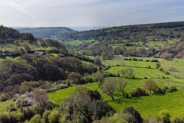 The lush green vista that unfolds before the Shibden property in its elevated location.