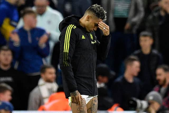 DEFEAT: Raphinha reacts to Leeds United's latest result (Photo by OLI SCARFF/AFP via Getty Images)