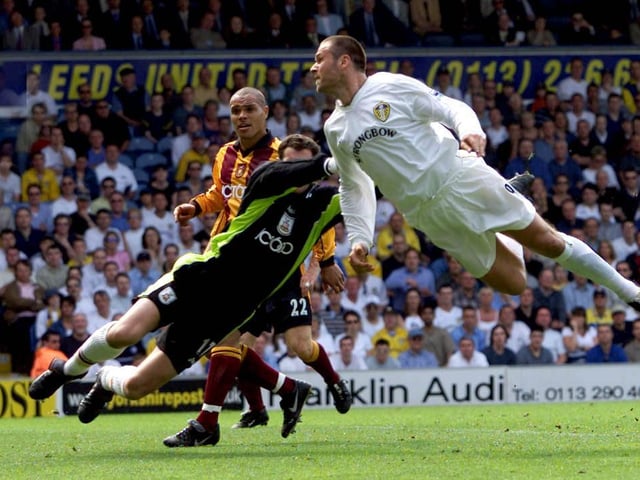 Mark Viduka heads home to open the scoring.