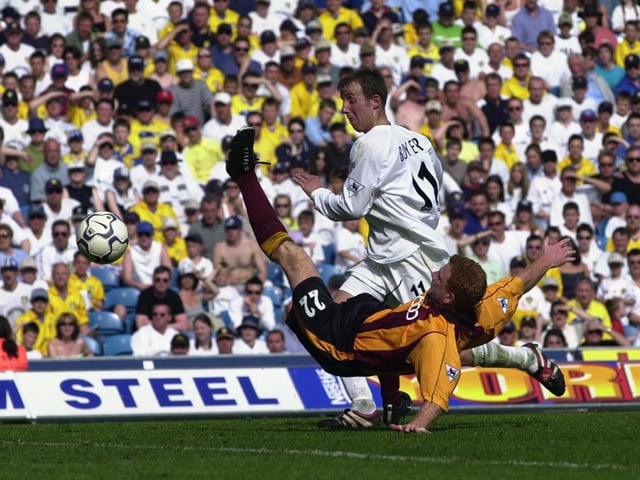 Lee Bowyer beats Bradford City's Wayne Jacobs to make it 6-1 to Leeds United.