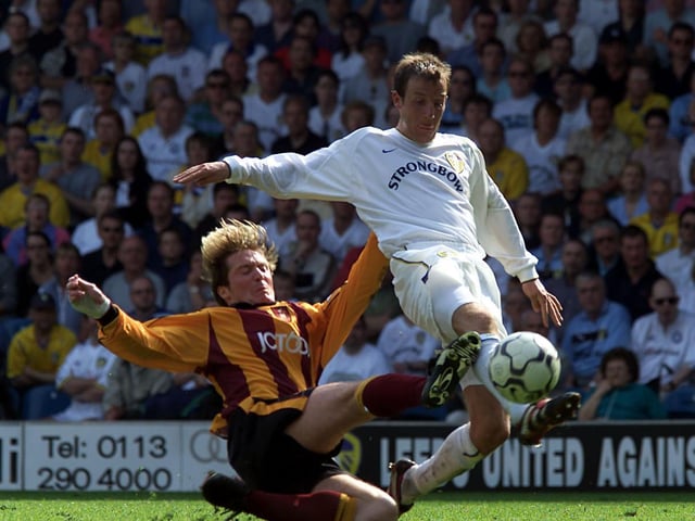 Lee Bowyer gets the better of Bradford City's Gary Locke.