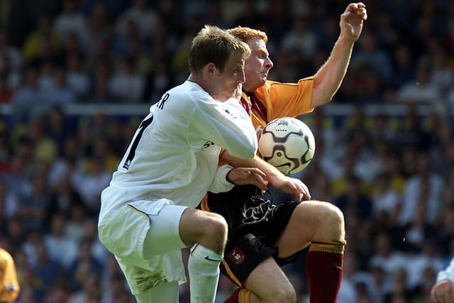 Lee Bowyer tussles with Bradford City's Wayne Jacobs.