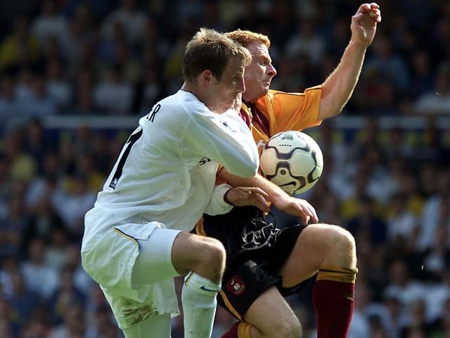 Lee Bowyer tussles with Bradford City's Wayne Jacobs.
