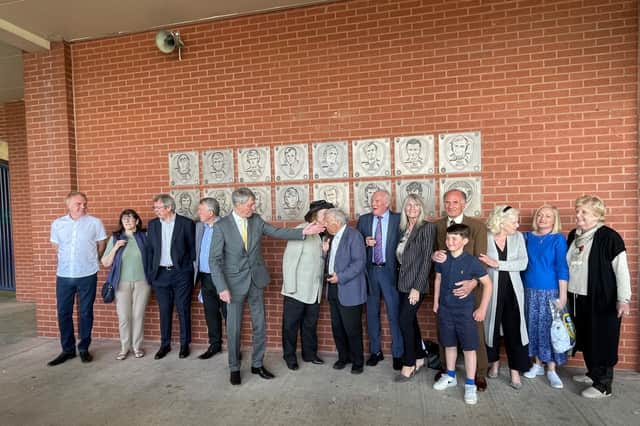 CHAMPIONS: 1972 FA Cup winners (L to R) David Harvey, Mick Jones, Allan Clarke, Johnny Giles, Eddie Gray and Paul Reaney are joined by family members at Elland Road in front of their new commemorative plaques marking the anniversary