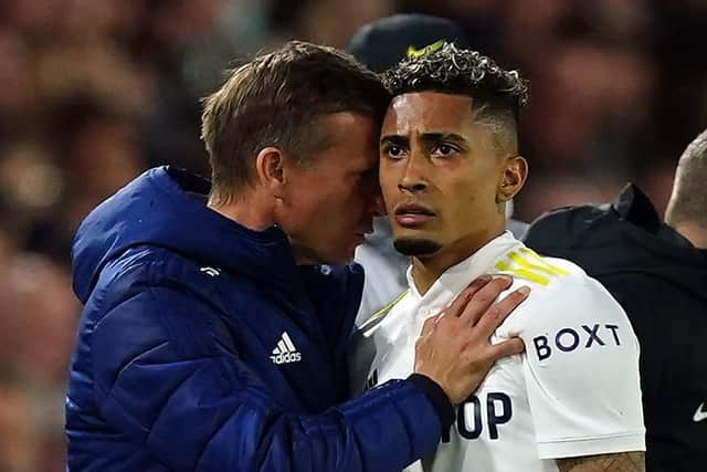 Leeds United manager Jesse Marsch speaks to Raphinha as he is substituted during the Premier League defeat to Chelsea. Picture: Mike Egerton/PA Wire.