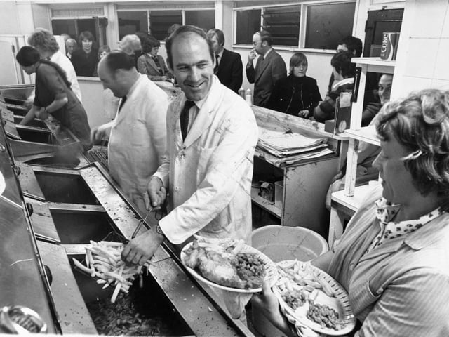 Mr Jackson prepares an order for Lily Rose, one of the waitresses at Bryan's, in Headingley in September 1974.