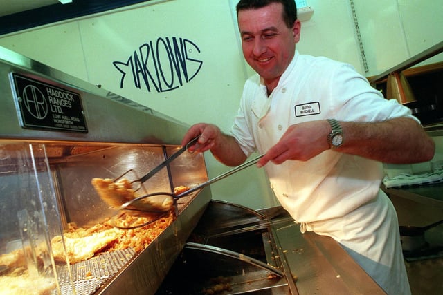 General manager Dave Mitchell works his magic in the kitchen at Marlows on Street Lane in March 1999.