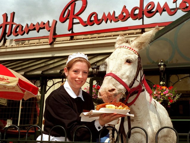 Karen Grimmit of Harry Ramsden's in Guiseley, Leeds, feeds donkey 'Jeremiah' fish and chips in a celebration of Yorkshire Day in 1996.