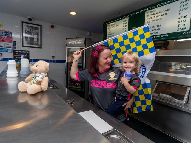 This is Ina Thompson owner of Graveleys opposite Elland Road. She is pictured with her young song Alexander in July 2020.