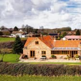 This sizeable home, built on the site of a former farmhouse, is for sale priced £800,000.