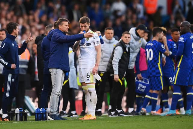 MESSAGE: From Leeds United captain Liam Cooper, centre, pictured with Whites boss Jesse Marsch, left, during Wednesday night's 3-0 defeat at home to Chelsea.
Photo by Stu Forster/Getty Images.
