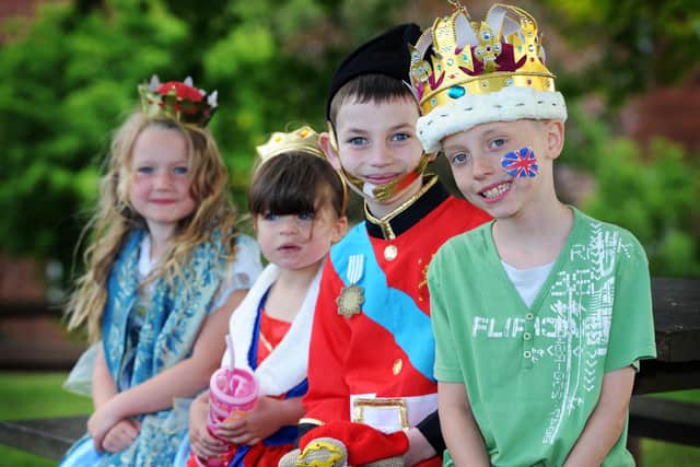 Gamble Hill Residents Association hosted a street party in Leeds back in 2012 to mark the Queen's Diamond Jubilee. Pictured from left are Maddie Hawkins, Violet Bell, Robbie Allen and Bailey Rossiter. Picture: Jonathan Gawthorpe