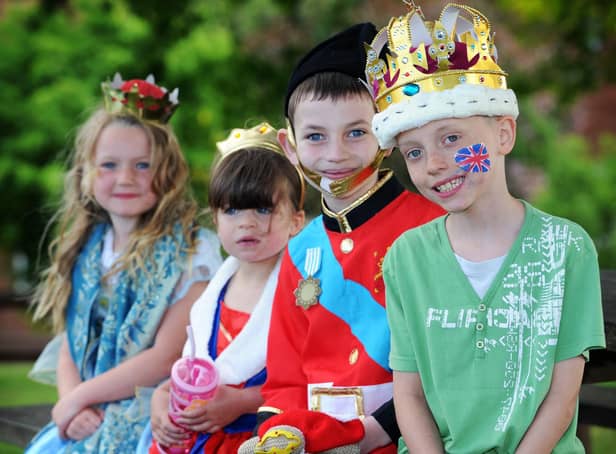 Gamble Hill Residents Association hosted a street party in Leeds back in 2012 to mark the Queen's Diamond Jubilee. Pictured from left are Maddie Hawkins, Violet Bell, Robbie Allen and Bailey Rossiter. Picture: Jonathan Gawthorpe