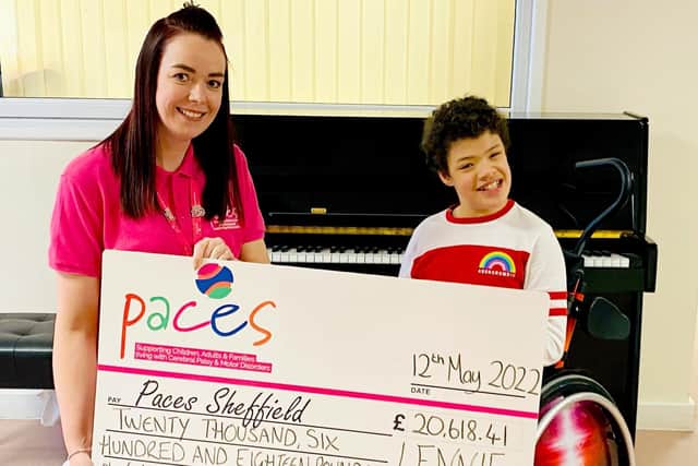 Lennie has presented more than £20,000 to Paces Sheffield. Picture; PA