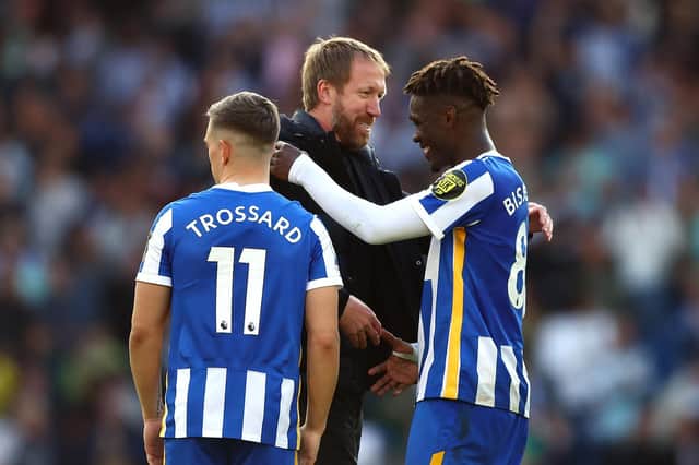 Graham Potter congratulates his players after their recent victory over Manchester United (Photo by Bryn Lennon/Getty Images)