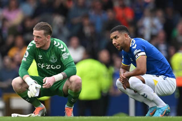 Everton 'keeper Jordan Pickford and defender Mason Holgate react to the Toffees' defeat. Pic: Paul Ellis