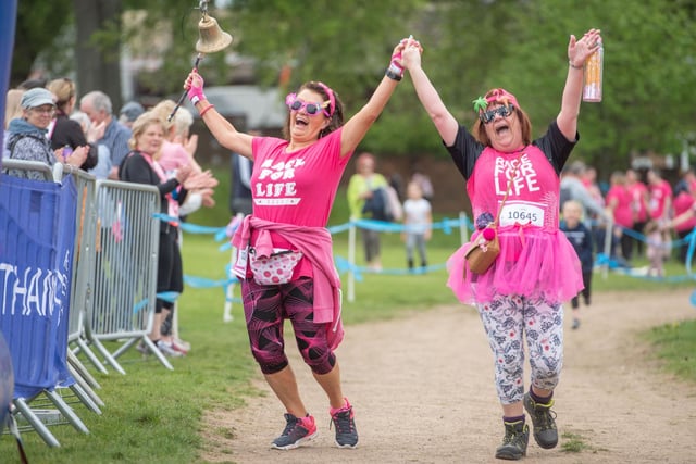 These runners kept each other's spirits up as they tackled the run.