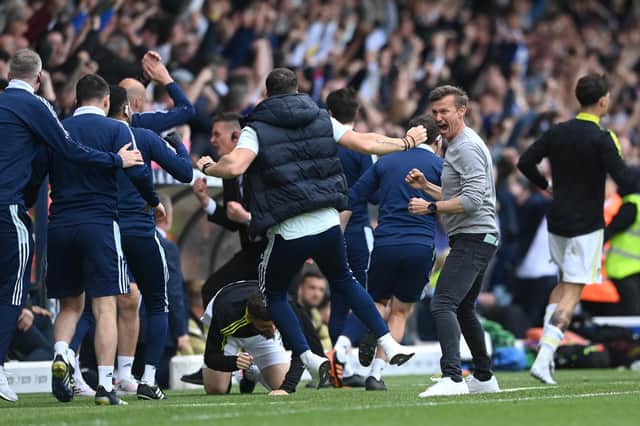 ELATION: Whites boss Jesse Marsch, second right, and his Leeds United staff and players celebrate Pascal Struijk's dramatic late leveller against Brighton in Sunday's 1-1 draw at Elland Road. Photo by Stu Forster/Getty Images.