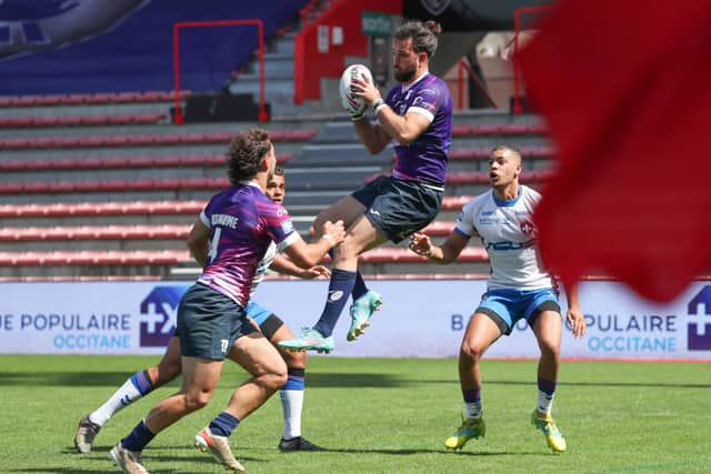 Good catch: Toulouse's Paul Marcon gathers the ball int he win over Wakefield. Picture by Manuel Blondeau/SWpix.com