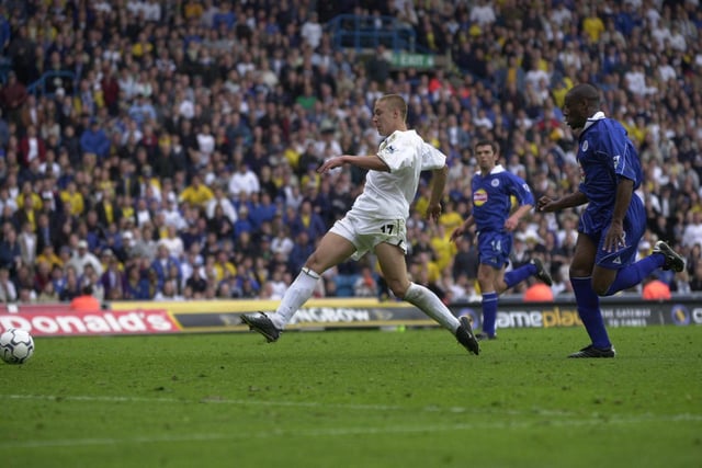 Alan Smith fires home his second goal of the game.