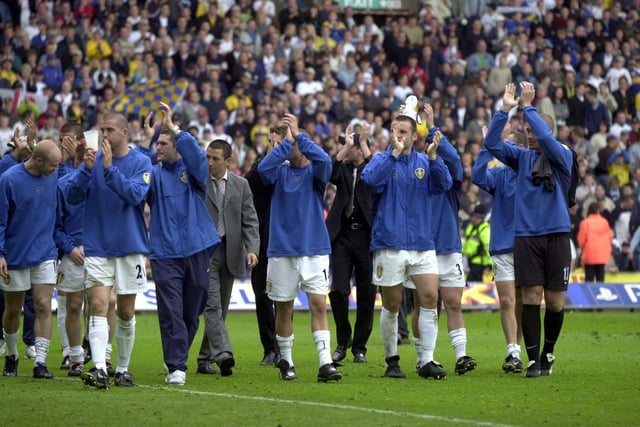 The Leeds United players salute the fans after the match.