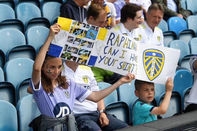 Young fans with a request for their favourite Brazilian.